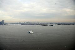 05-18 Brooklyn And Governors Island From The Crown Inside The Statue Of Liberty.jpg